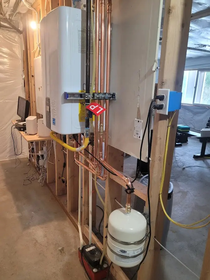Licensed plumber repairing a kitchen sink in Sweetwater